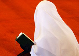 Woman Reading Koran
